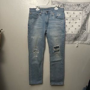 Levi’s 511 slim factory distressed light wash jean